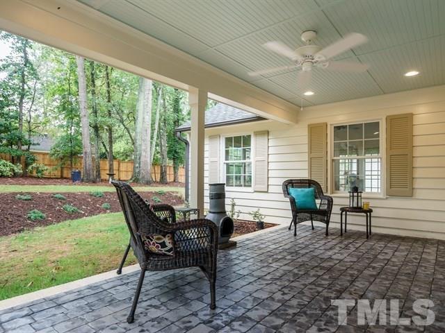 3317 Redbud Lane Raleigh, NC 27607 - Photo 24 of 25 a dining room with furniture and a yard