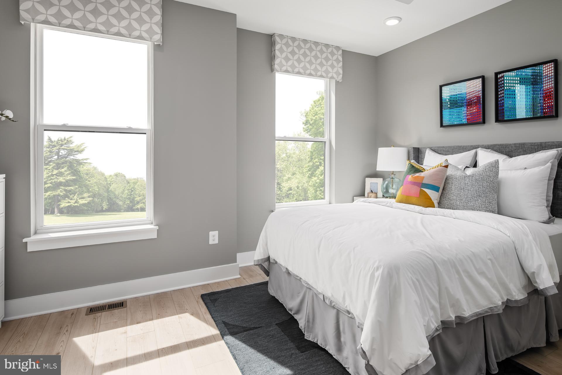 2607 Light Street Baltimore, MD 21230 - Photo 11 of 29 a bedroom with a bed and a window