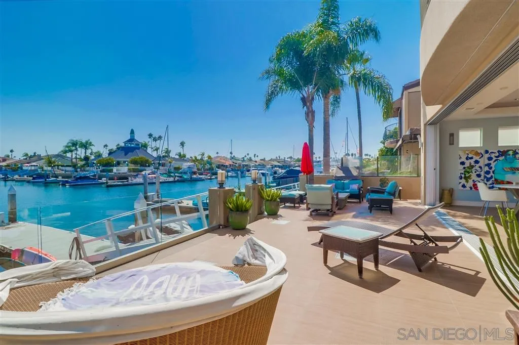 22 Green Turtle Road Coronado, CA 92118 - Photo 11 of 25 a view of a swimming pool with lounge chairs