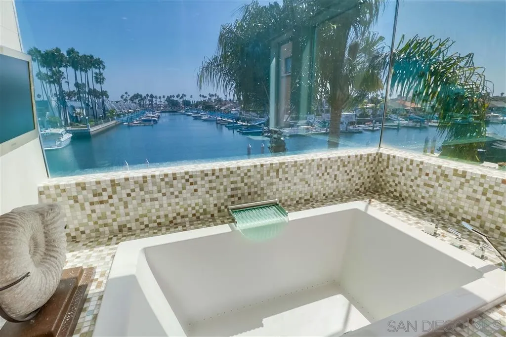 22 Green Turtle Road Coronado, CA 92118 - Photo 16 of 25 a view of a swimming pool with outdoor seating