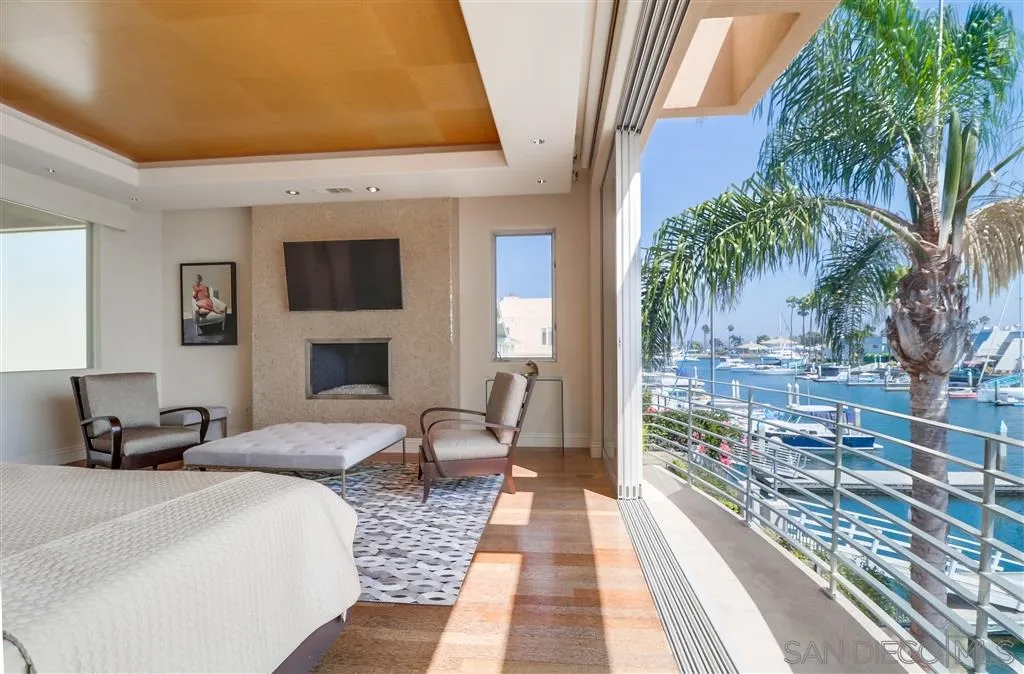 22 Green Turtle Road Coronado, CA 92118 - Photo 17 of 25 a living room with furniture and a fireplace