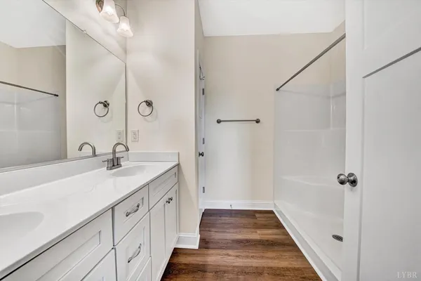 a bathroom with a sink and a large mirror