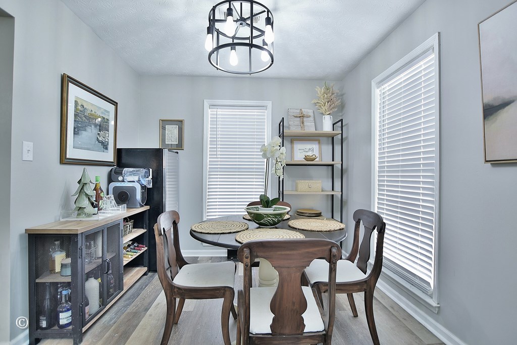 180 Mulberry Lane Fortson, GA 31808 - Photo 7 of 22 a view of a dining room with furniture and wooden floor