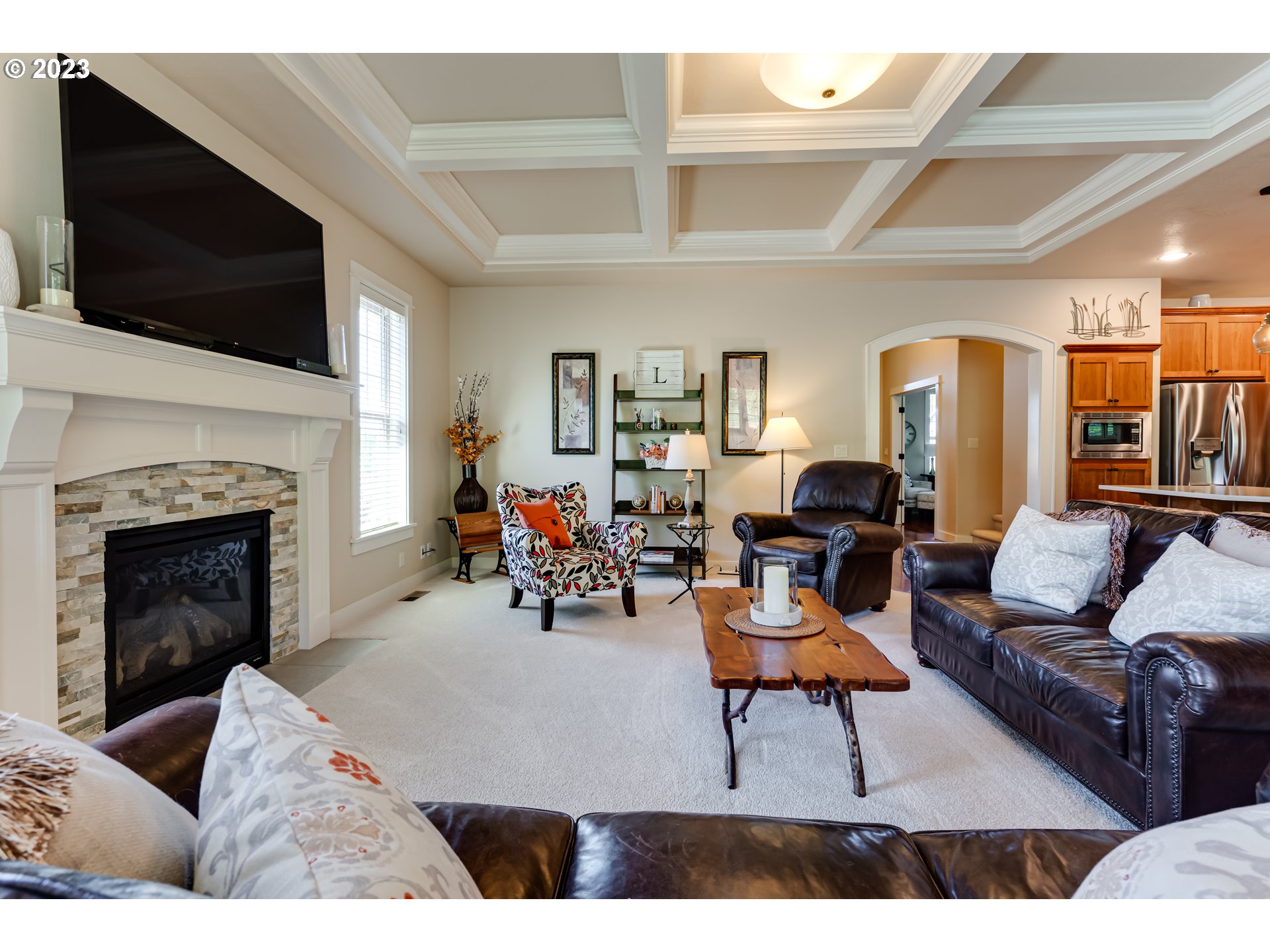 815 Mountaingate Drive Springfield, OR 97478 - Photo 14 of 44 a living room with furniture and a fireplace