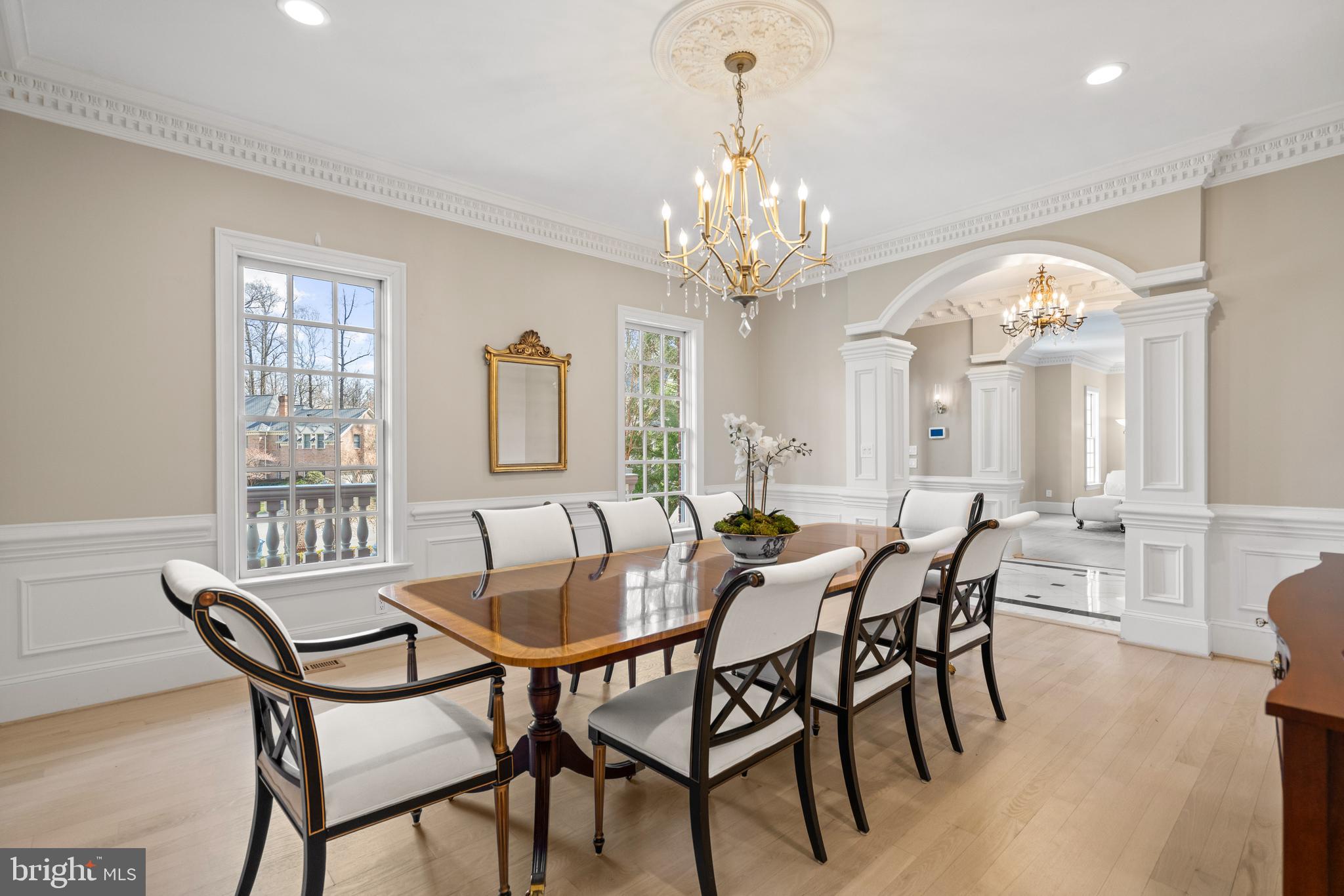 1106 Mill Ridge McLean, VA 22102 - Photo 14 of 85 a view of a dining room with furniture a chandelier and wooden floor