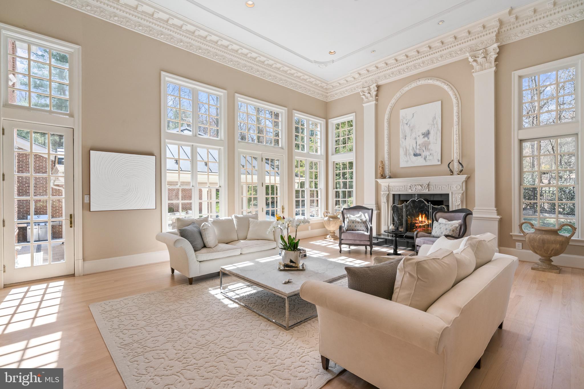 1106 Mill Ridge McLean, VA 22102 - Photo 20 of 85 a living room with furniture fireplace and a large window