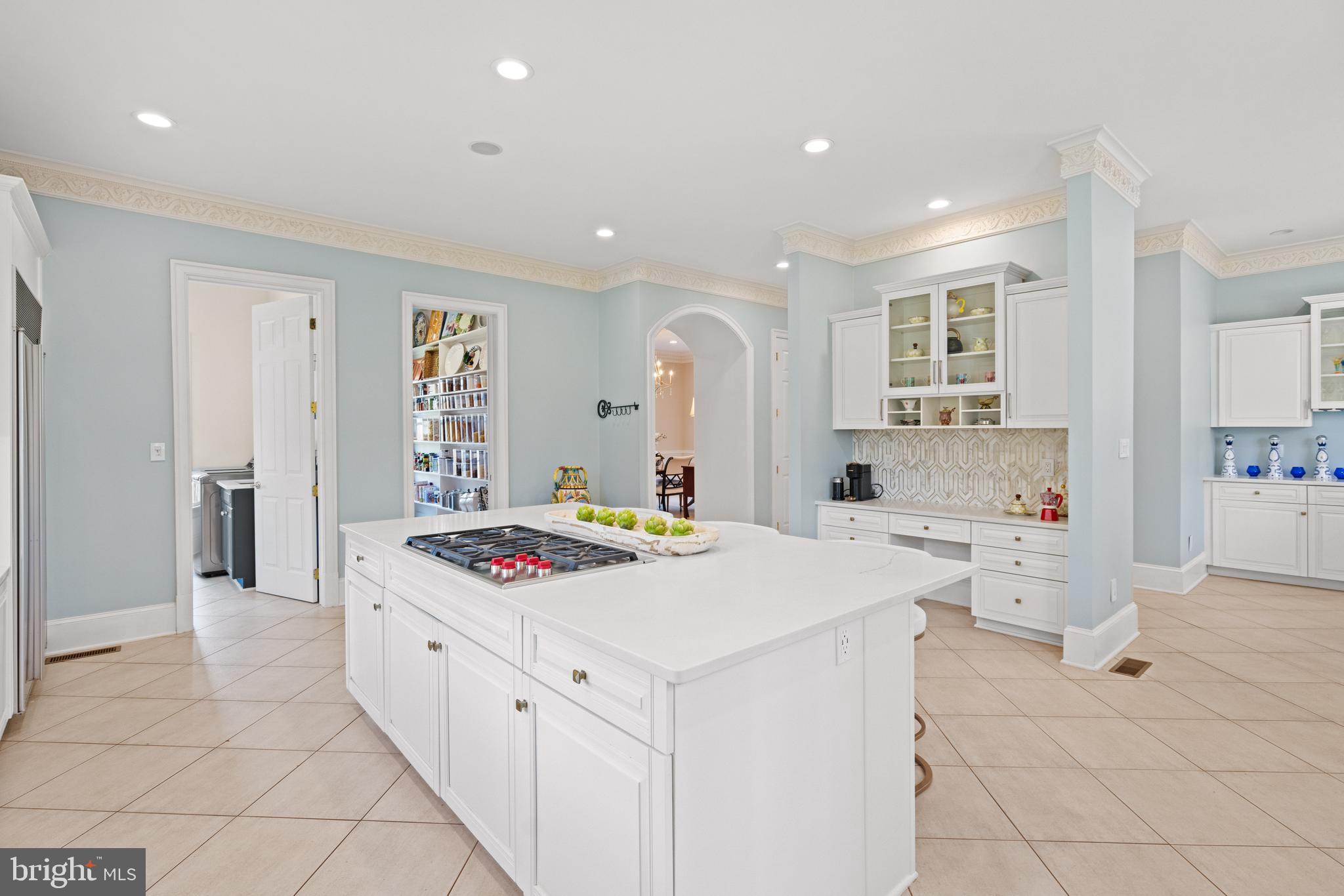 1106 Mill Ridge McLean, VA 22102 - Photo 34 of 85 a kitchen that has a lot of cabinets in it and wooden floor