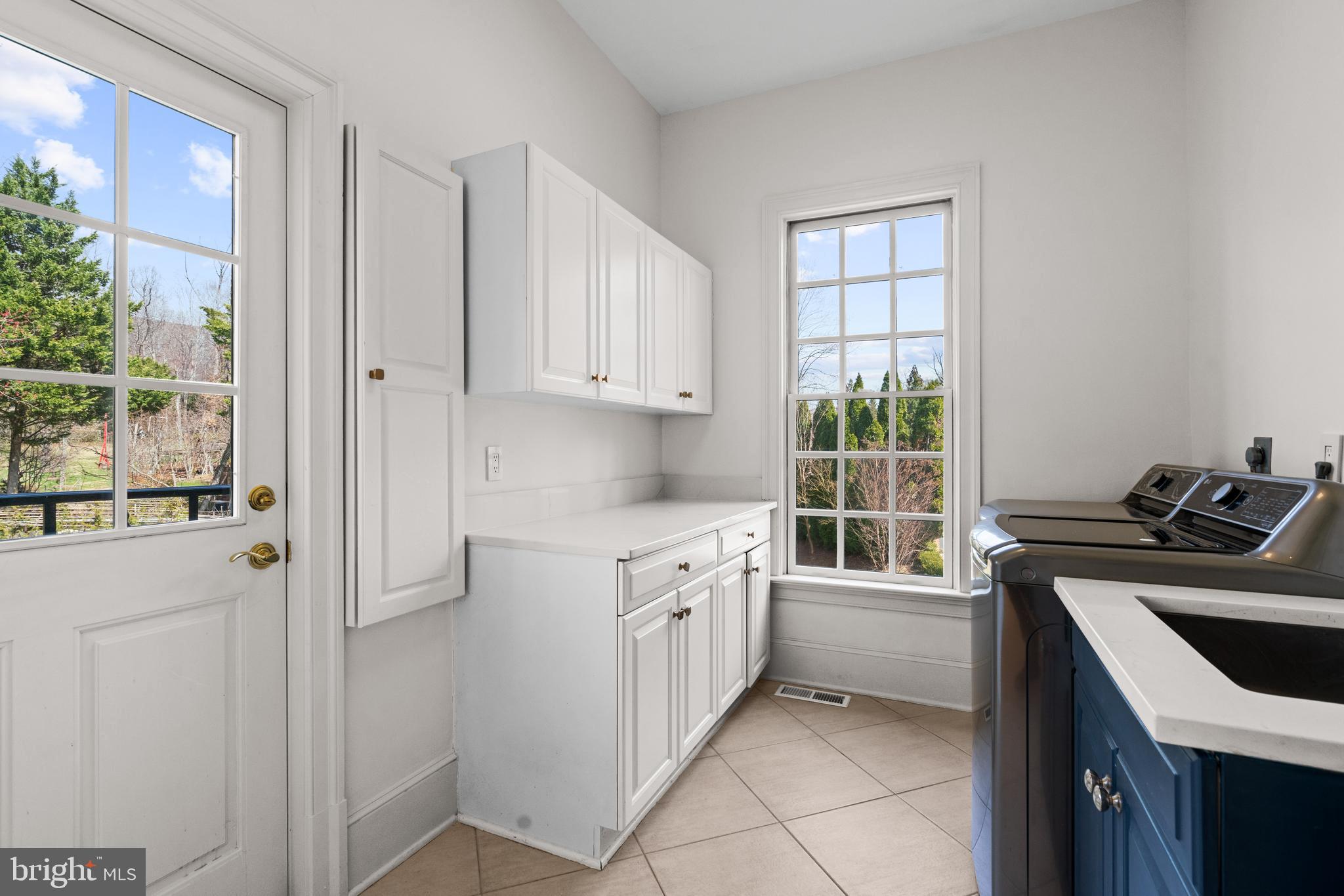 1106 Mill Ridge McLean, VA 22102 - Photo 38 of 85 a kitchen with a sink stove and cabinets