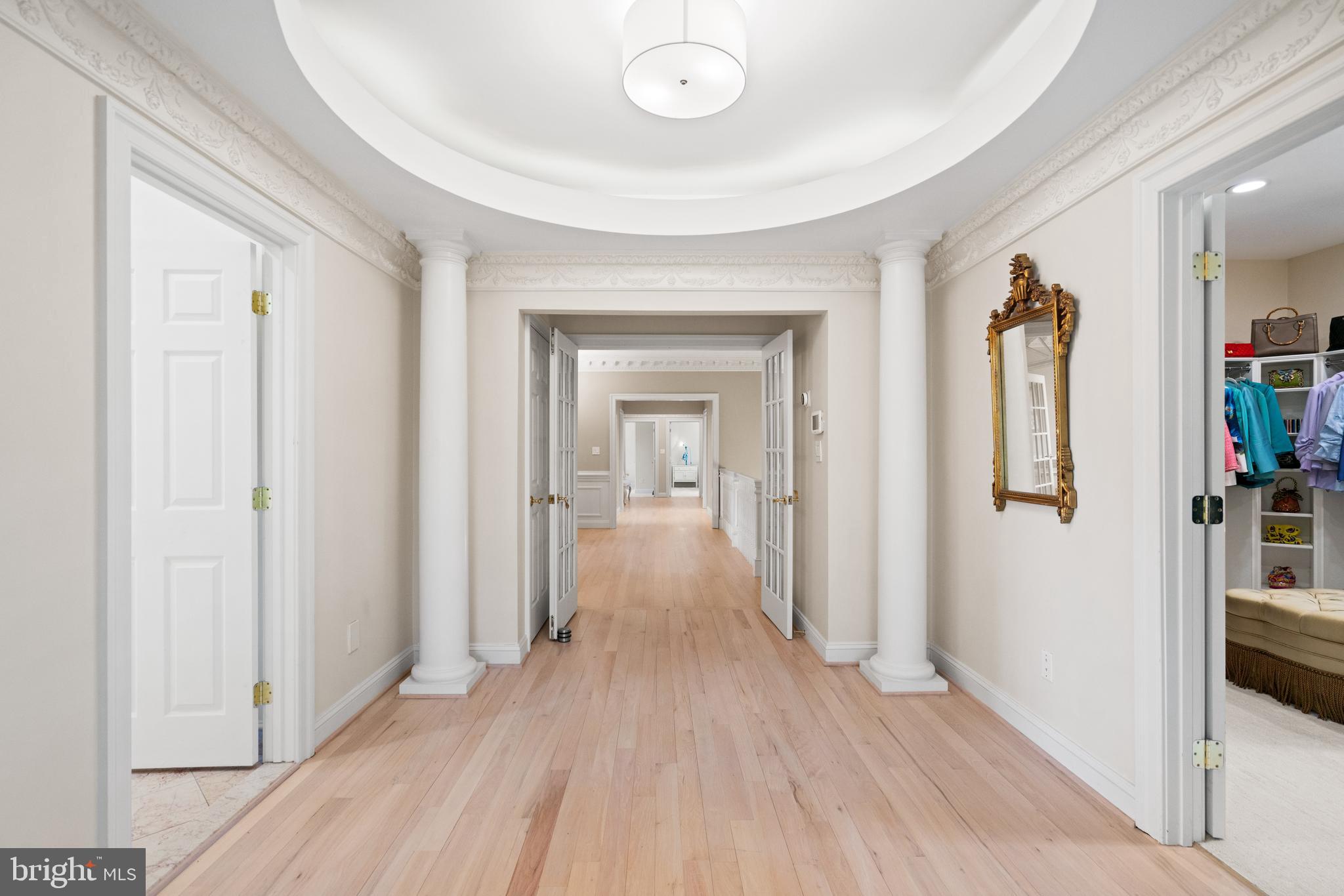 1106 Mill Ridge McLean, VA 22102 - Photo 44 of 85 a view of a hallway view with wooden floor and staircase