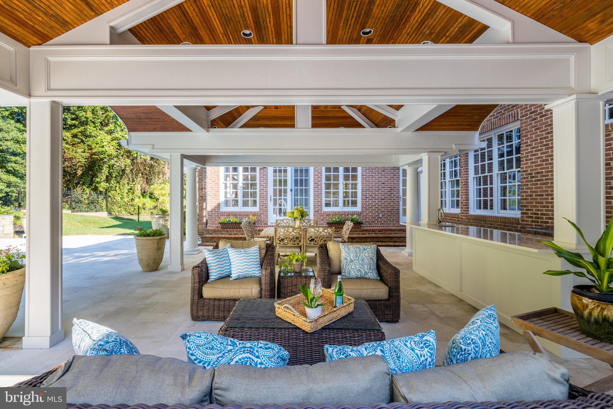 1106 Mill Ridge McLean, VA 22102 - Photo 5 of 6 a living room with furniture and floor to ceiling windows
