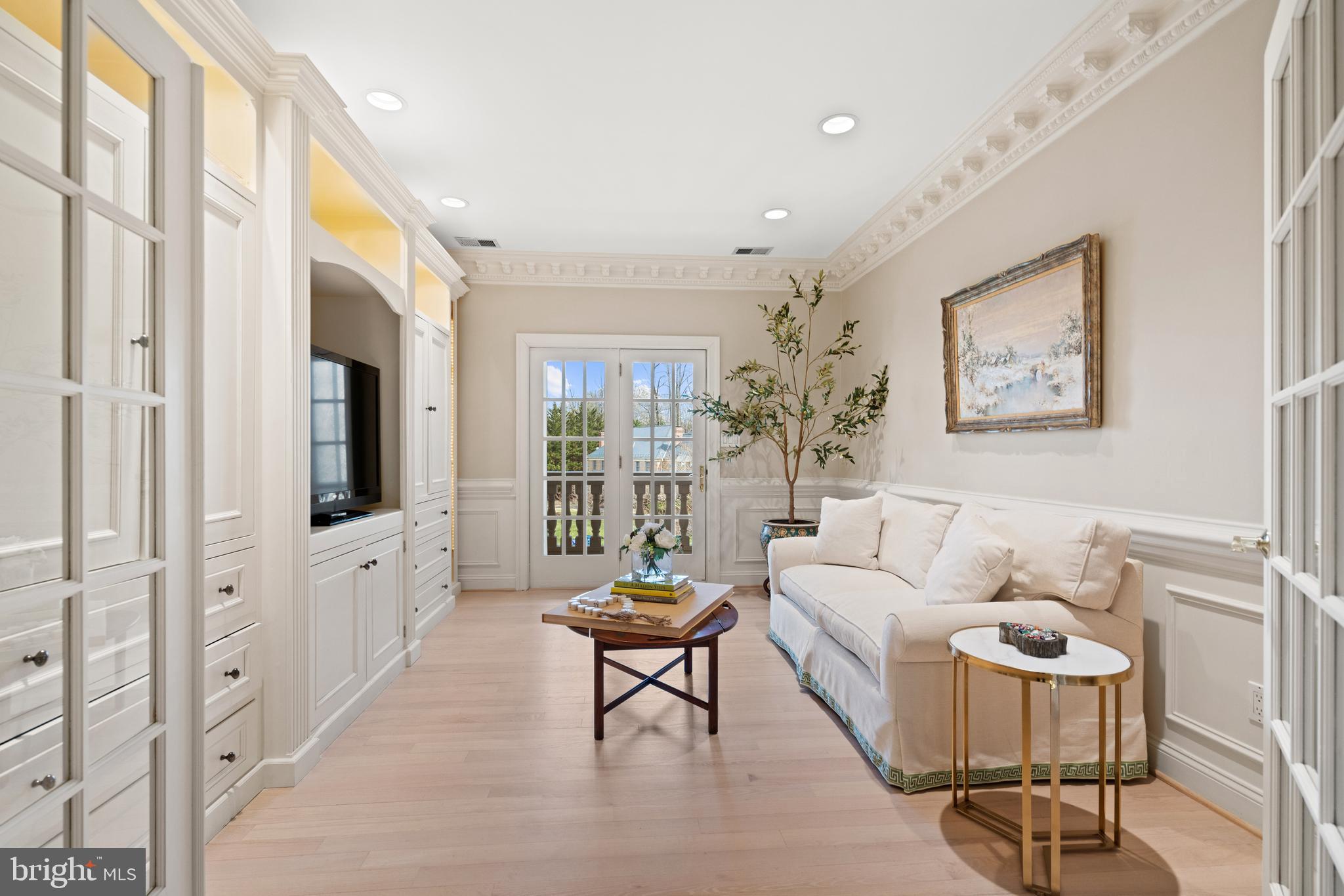 1106 Mill Ridge McLean, VA 22102 - Photo 55 of 85 a living room with furniture fireplace and a flat screen tv