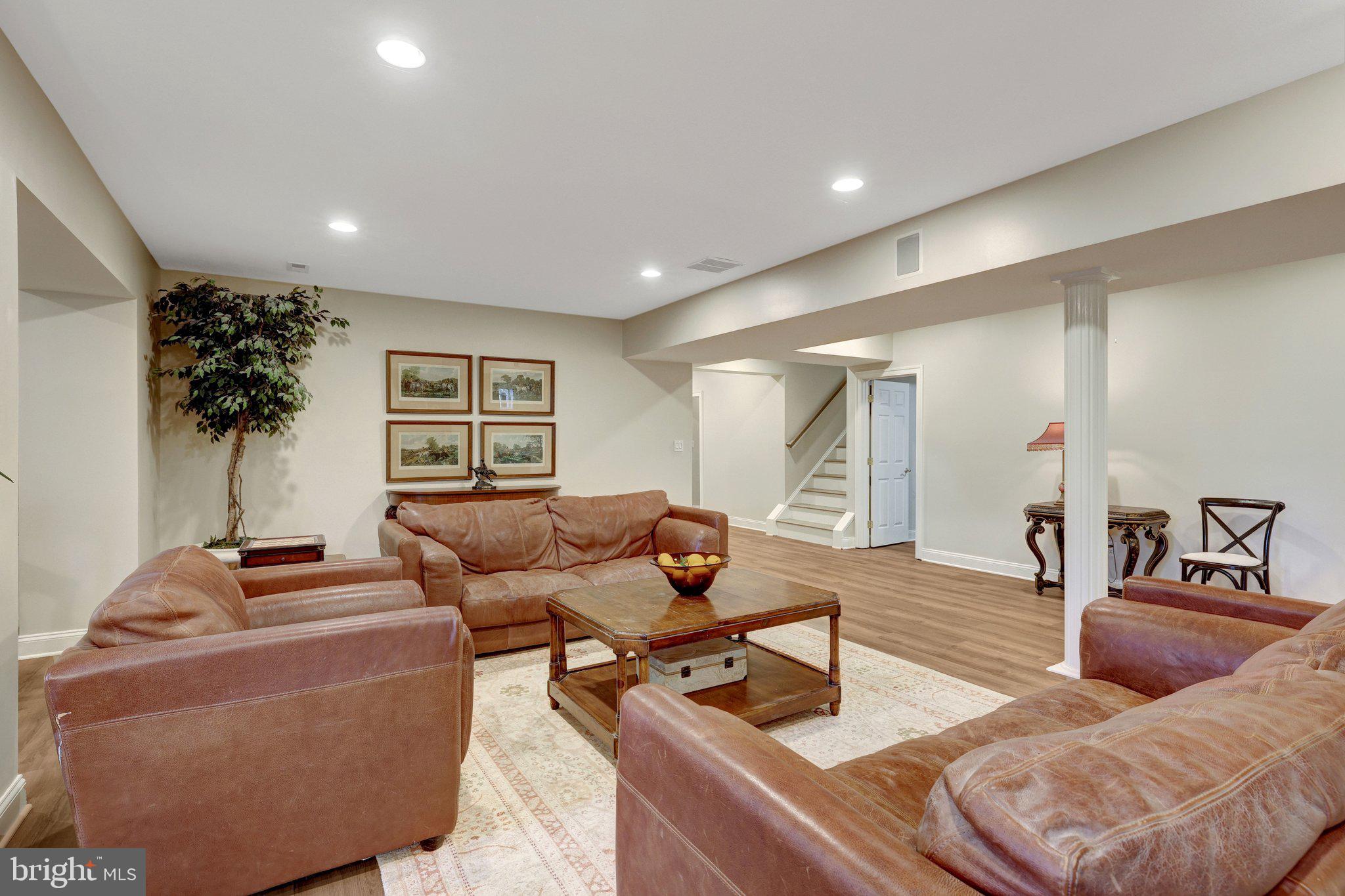 1106 Mill Ridge McLean, VA 22102 - Photo 64 of 85 a living room with furniture and wooden floor