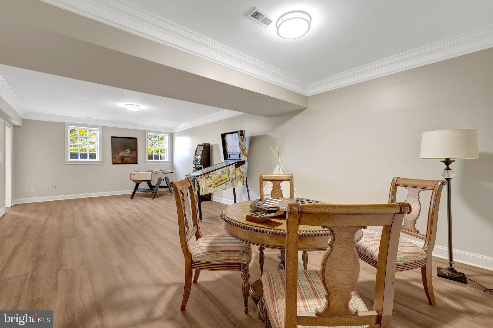 1106 Mill Ridge McLean, VA 22102 - Photo 67 of 85 a view of a dining room with furniture and wooden floor