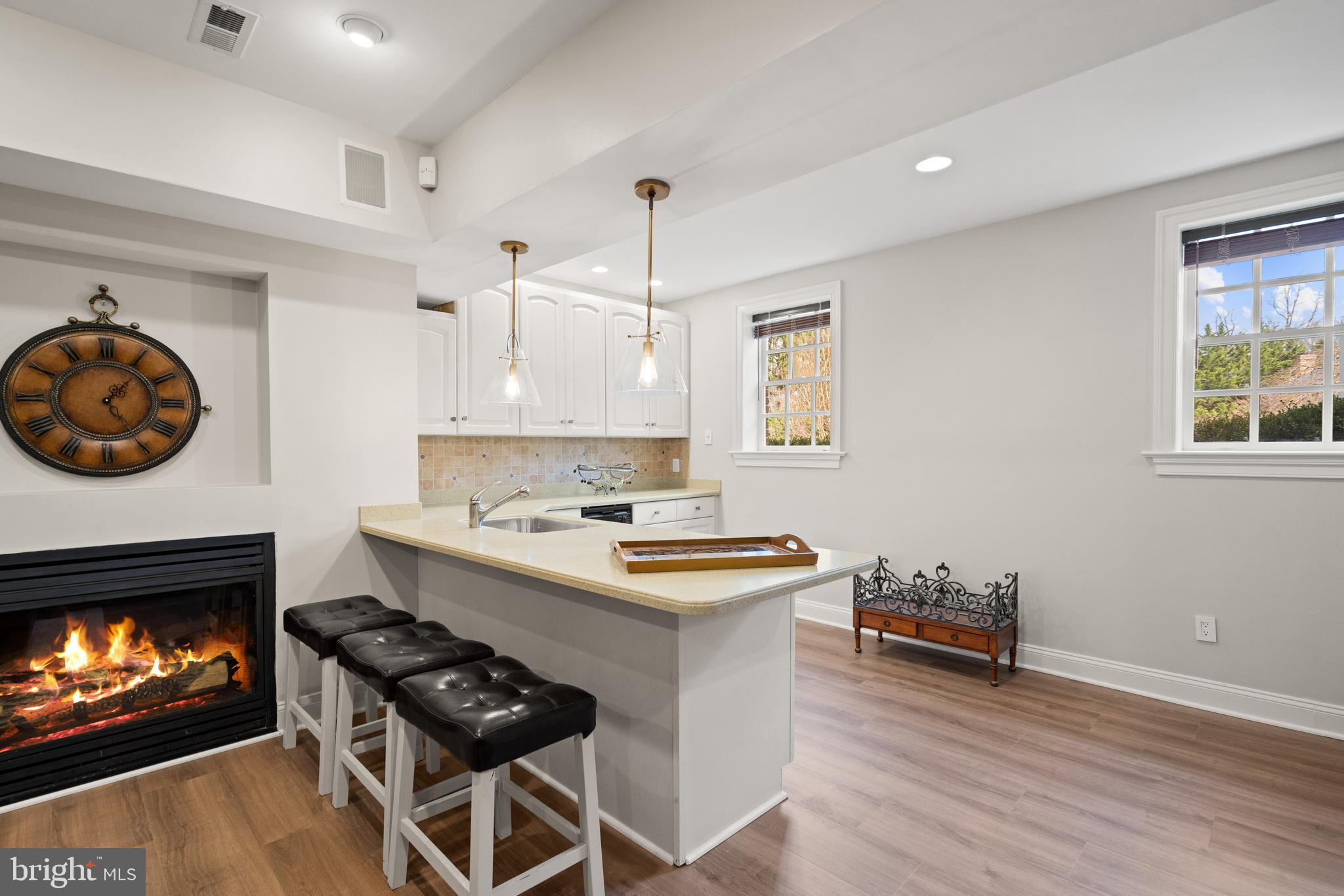 1106 Mill Ridge McLean, VA 22102 - Photo 70 of 85 a kitchen with stainless steel appliances a stove a sink and a fireplace