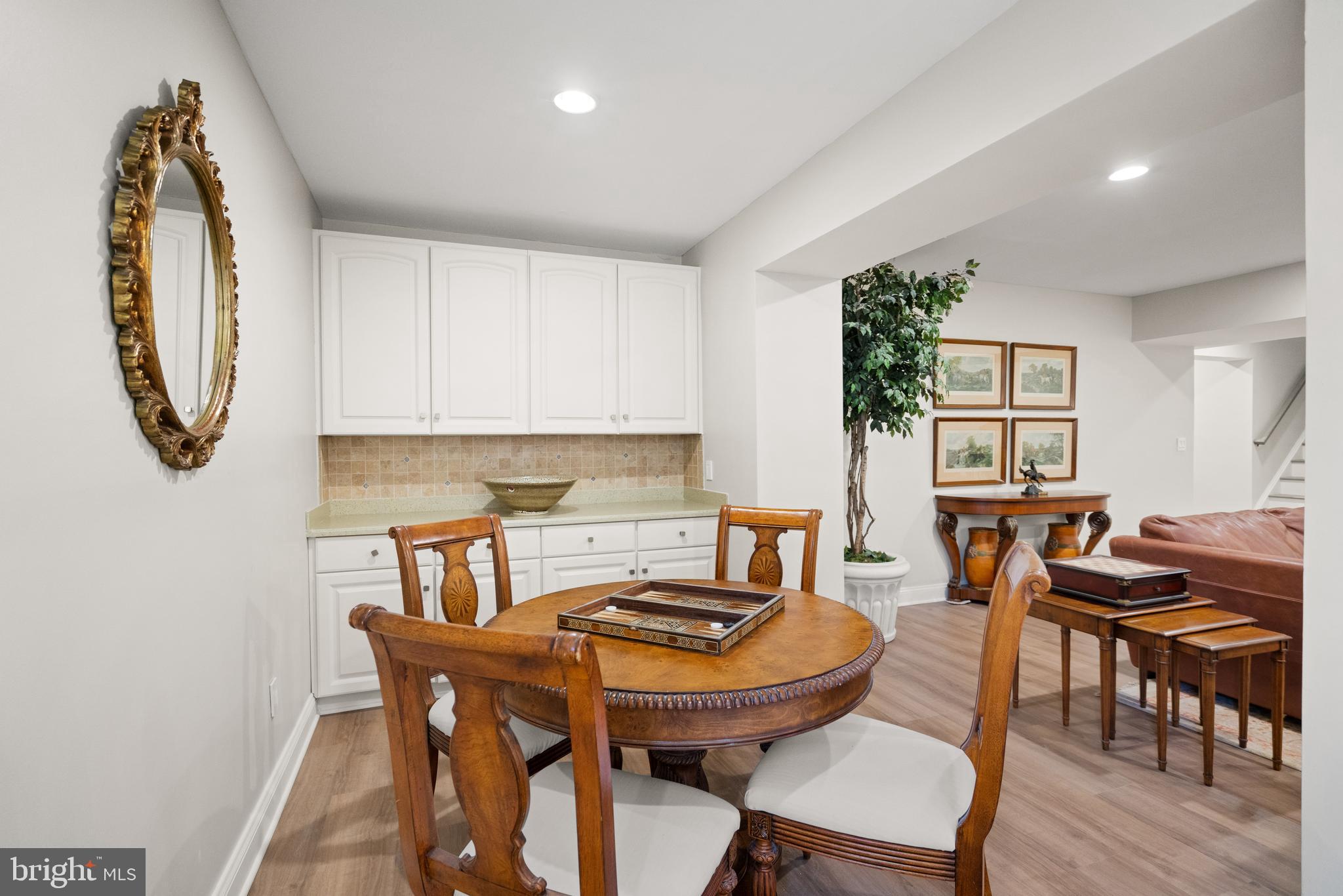 1106 Mill Ridge McLean, VA 22102 - Photo 72 of 85 a view of a dining room with furniture and wooden floor