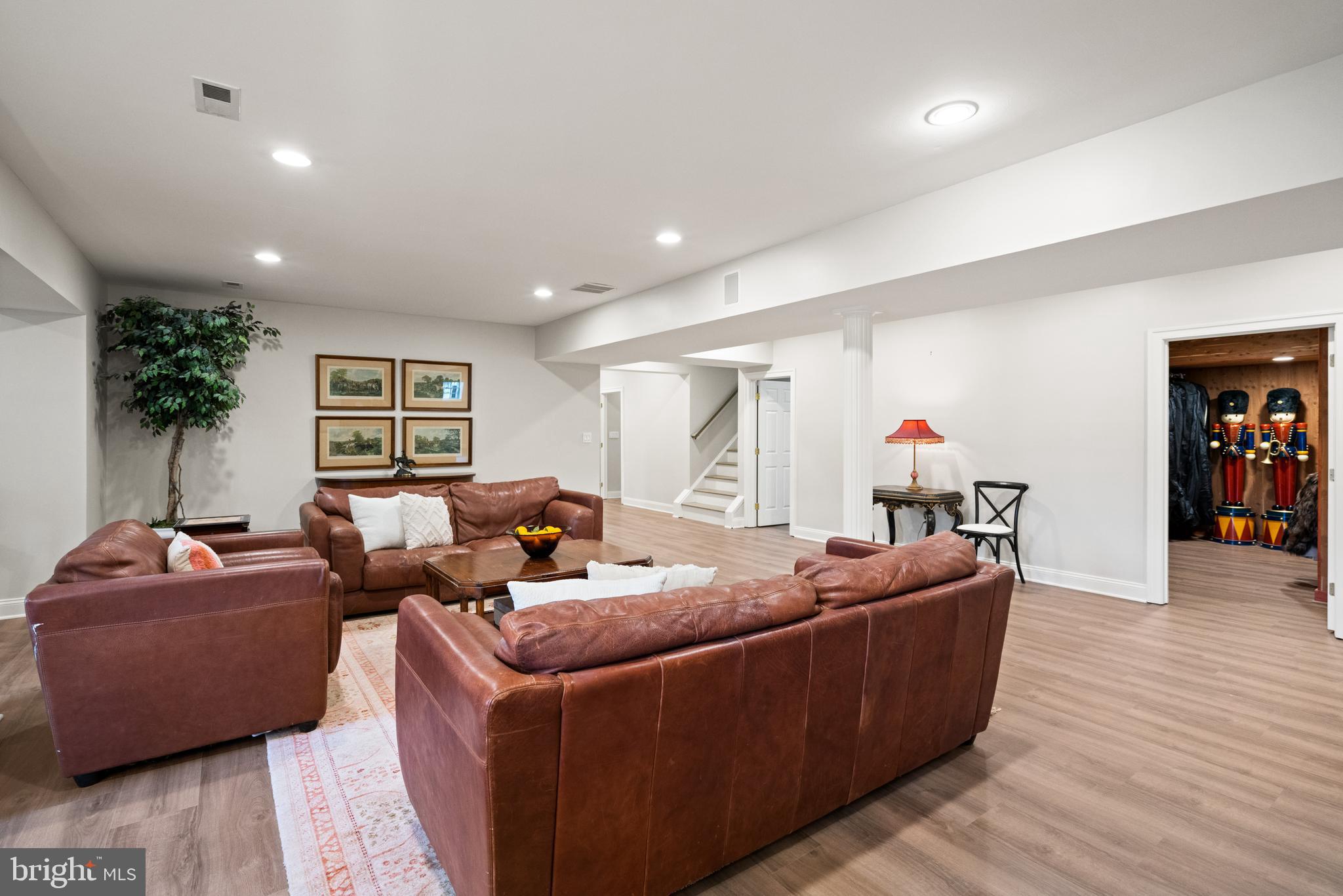1106 Mill Ridge McLean, VA 22102 - Photo 73 of 85 a living room with furniture and a wooden floor