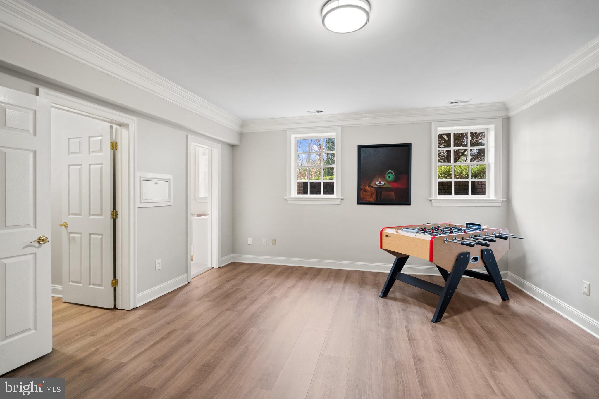 1106 Mill Ridge McLean, VA 22102 - Photo 80 of 85 an empty room with wooden floor and a window