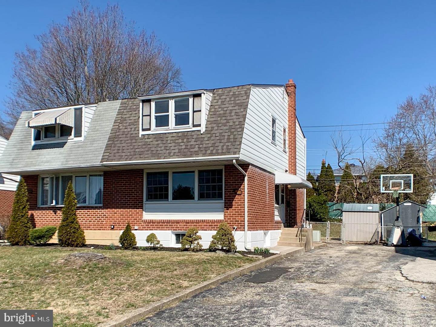 1567 Parklane Road Swarthmore, PA 19081 - Photo 1 of 23 a front view of a house with a outdoor space