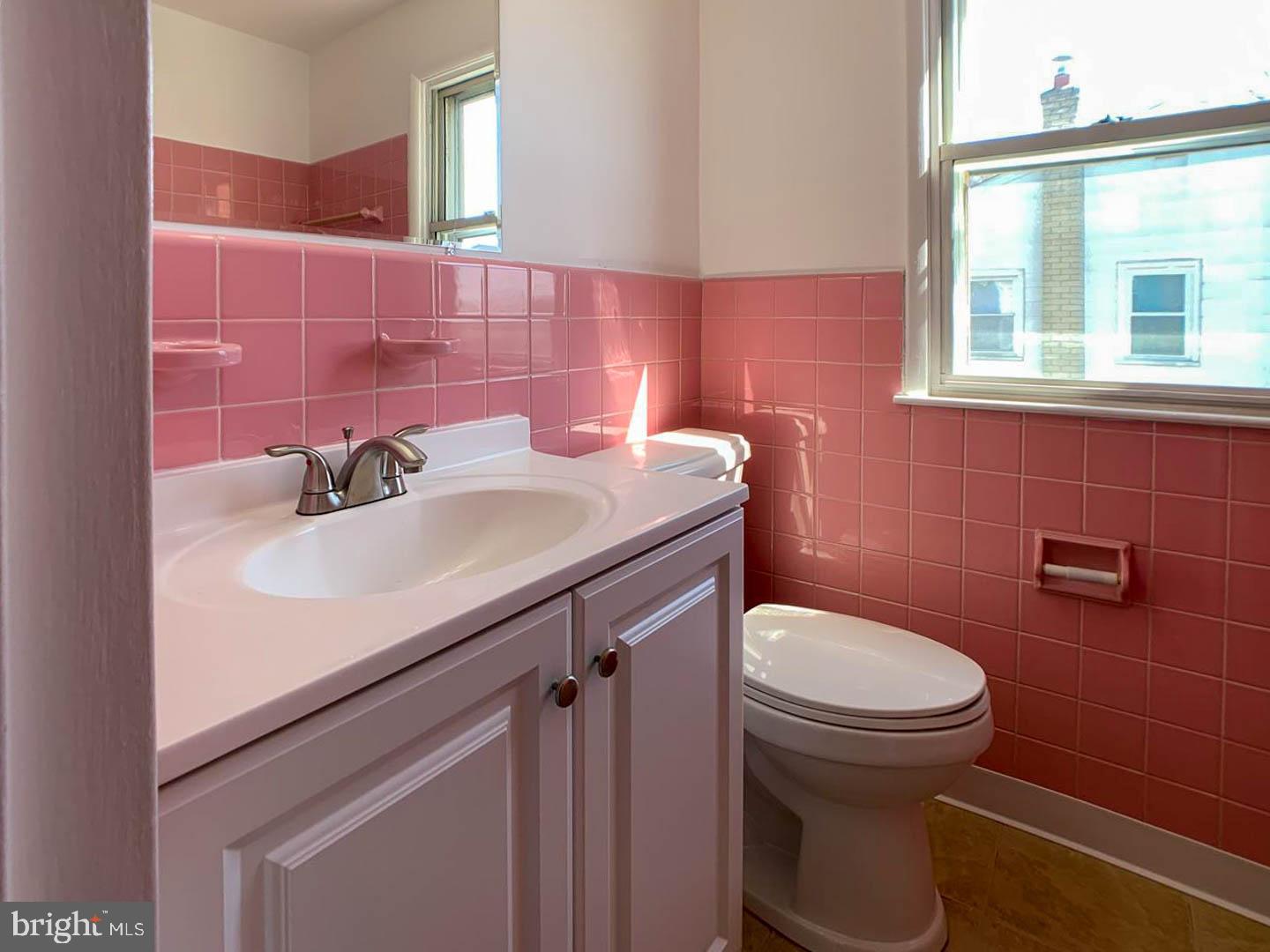 1567 Parklane Road Swarthmore, PA 19081 - Photo 22 of 23 a bathroom with a sink toilet and mirror