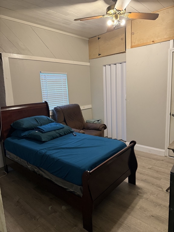 77 Roland Road Revere, MA 02151 - Photo 12 of 18 a bedroom with a bed and window