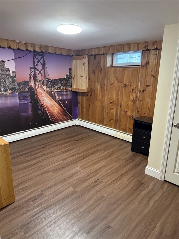 77 Roland Road Revere, MA 02151 - Photo 10 of 18 a view of a hallway with wooden floor