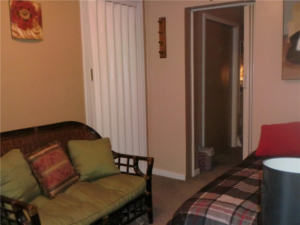 230 43rd Street Pittsburgh, PA 15201 - Photo 14 of 19 a living room with furniture and a lamp