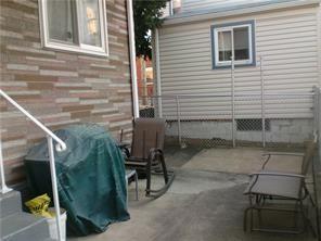 230 43rd Street Pittsburgh, PA 15201 - Photo 19 of 19 a backyard of a house with outdoor seating