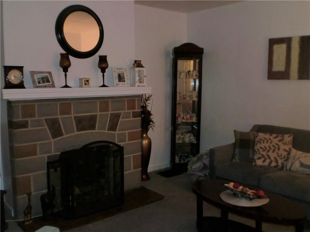 230 43rd Street Pittsburgh, PA 15201 - Photo 3 of 19 a front view of a house with wooden floor and furniture