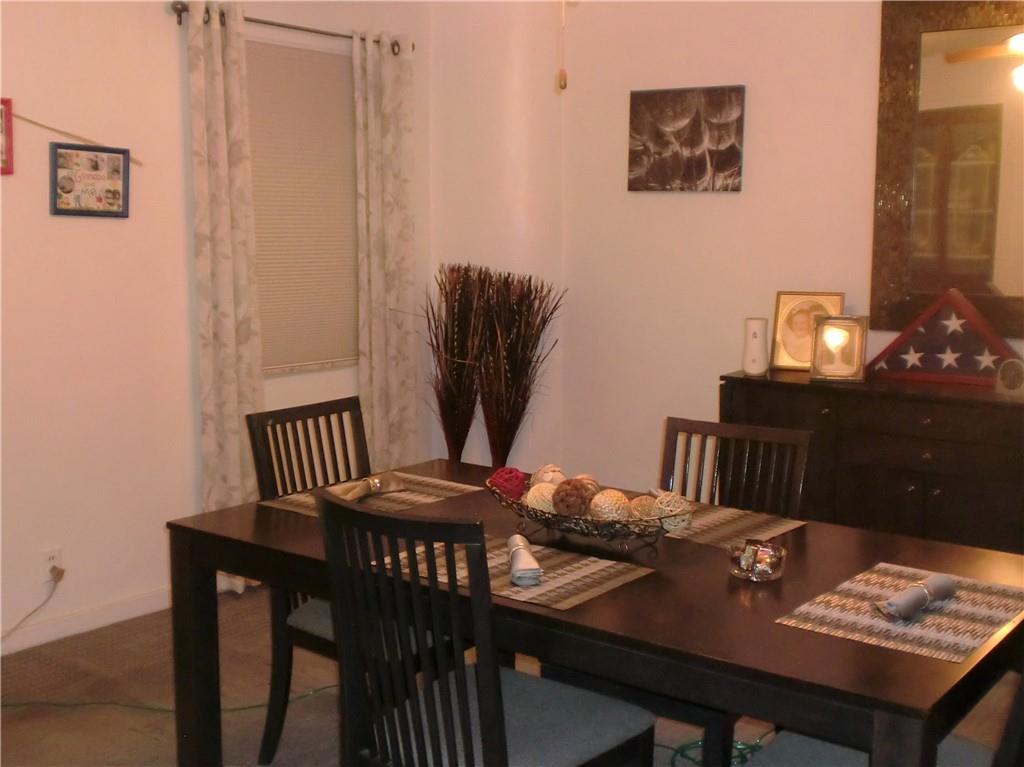 230 43rd Street Pittsburgh, PA 15201 - Photo 5 of 19 a view of a dining room with furniture and wooden floor