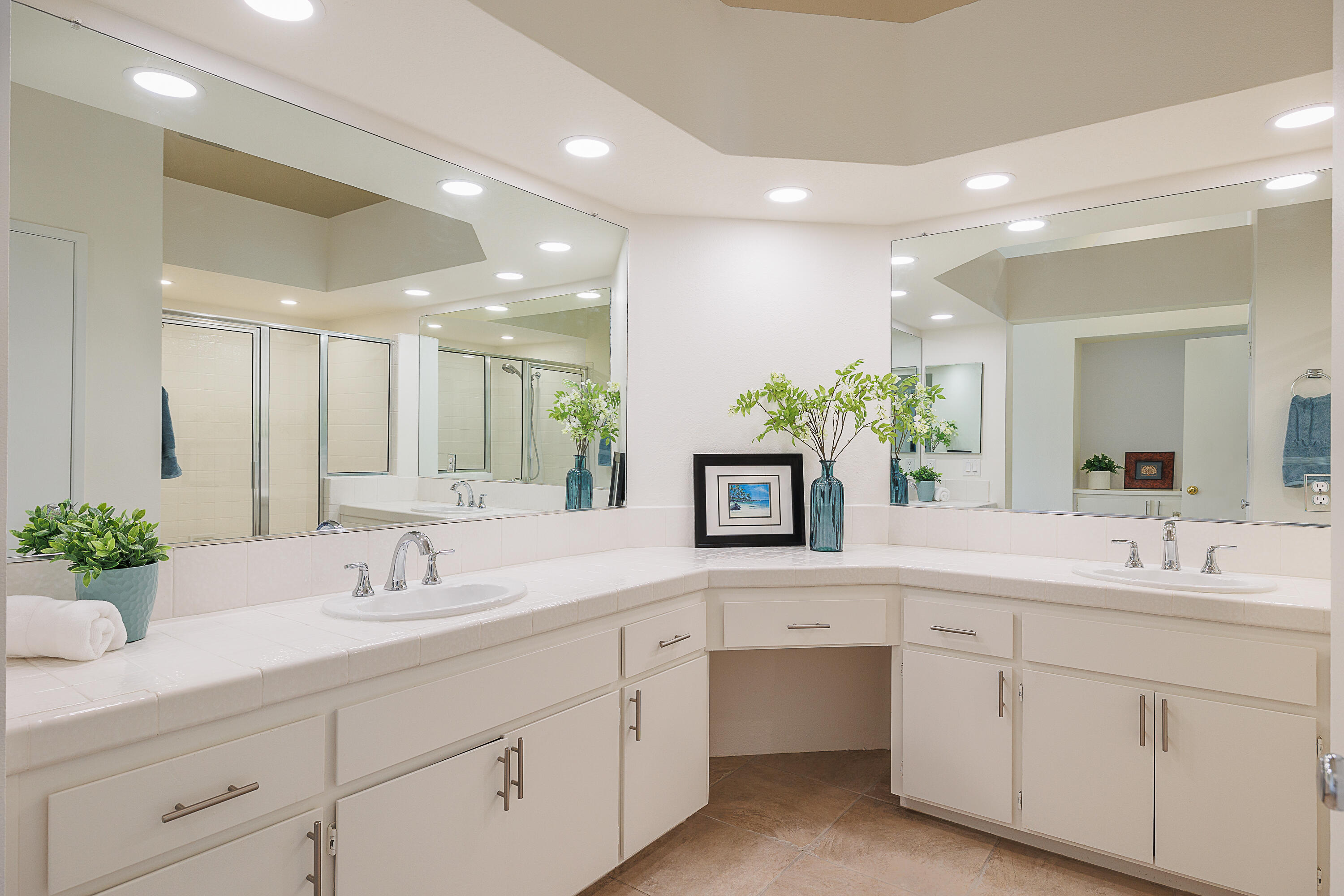 175 Firestone Drive Palm Desert, CA 92211 - Photo 11 of 24 a bathroom with a sink double vanity and mirror