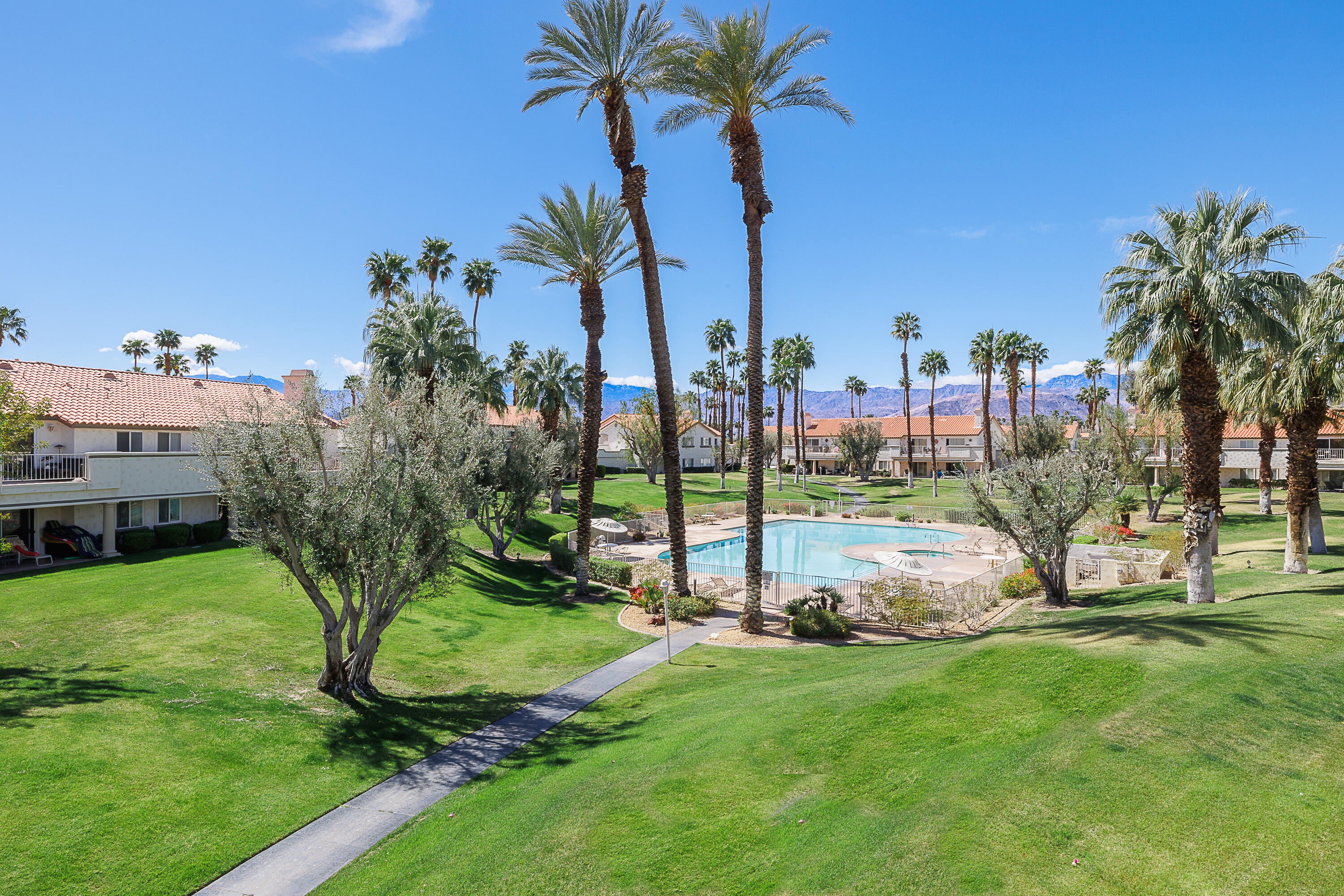 175 Firestone Drive Palm Desert, CA 92211 - Photo 15 of 24 a view of a park with palm trees