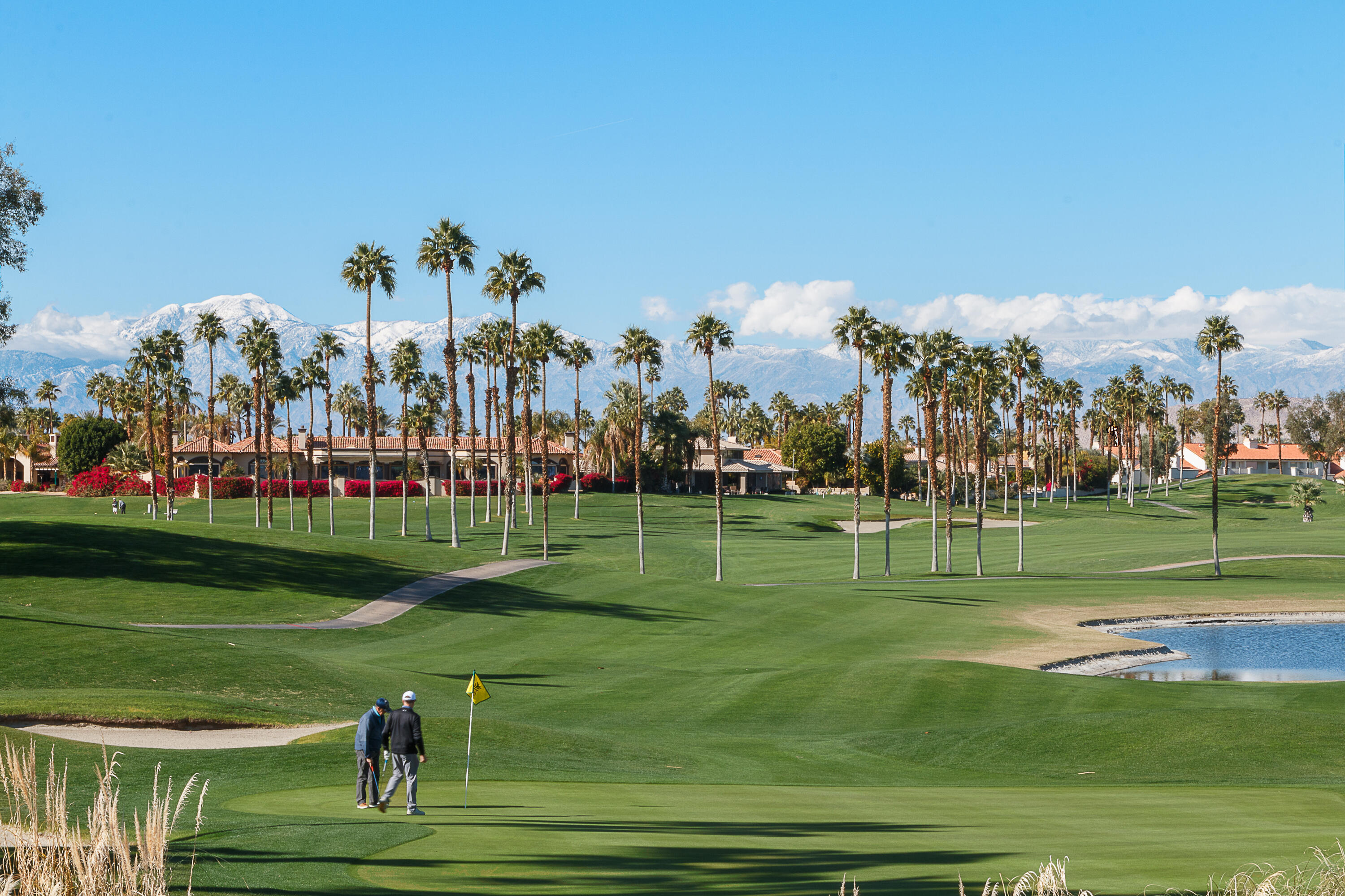 175 Firestone Drive Palm Desert, CA 92211 - Photo 24 of 24 a view of a golf course with a lake