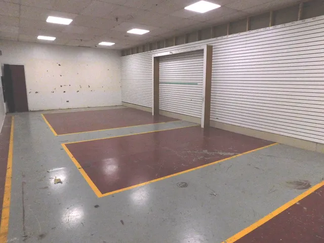 a front view of a house with basket ball court