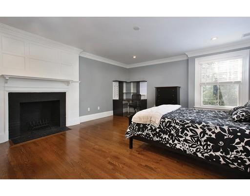 33 Kingsbury Road Newton, MA 02467 - Photo 13 of 23 a bed sitting in a spacious bedroom next to a window