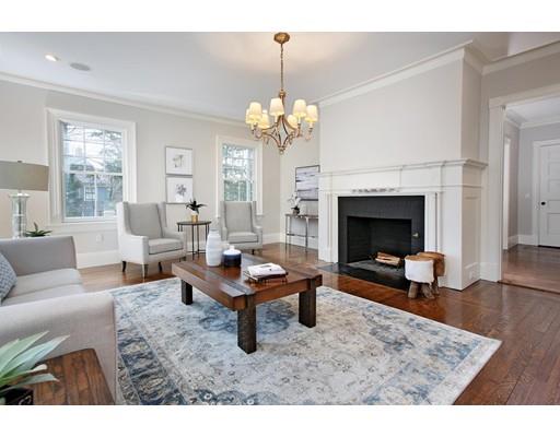 33 Kingsbury Road Newton, MA 02467 - Photo 3 of 23 a living room with furniture a fireplace and a chandelier