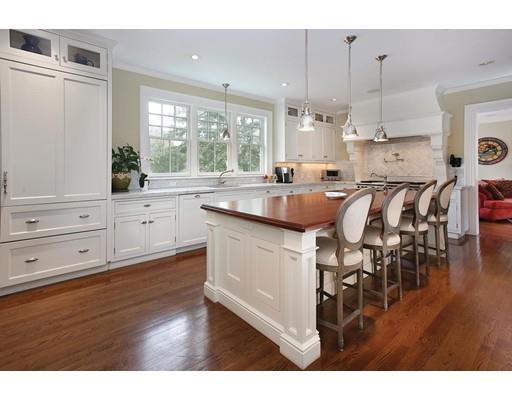 33 Kingsbury Road Newton, MA 02467 - Photo 7 of 23 a kitchen with appliances cabinets and wooden floor