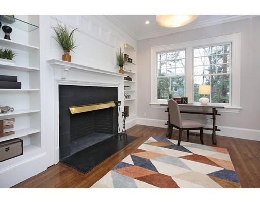 33 Kingsbury Road Newton, MA 02467 - Photo 10 of 23 a living room with furniture and a fireplace