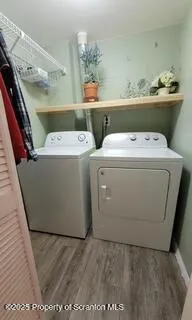 a utility room with dryer and washer