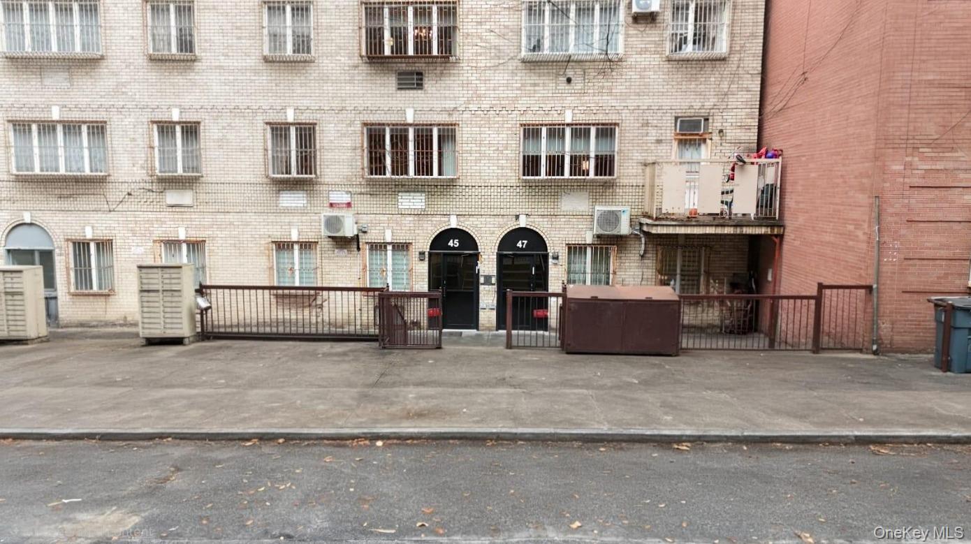 47 South 8th Street, Unit 1B Brooklyn, NY 11249 - Photo 1 of 7 a view of a brick building with many windows