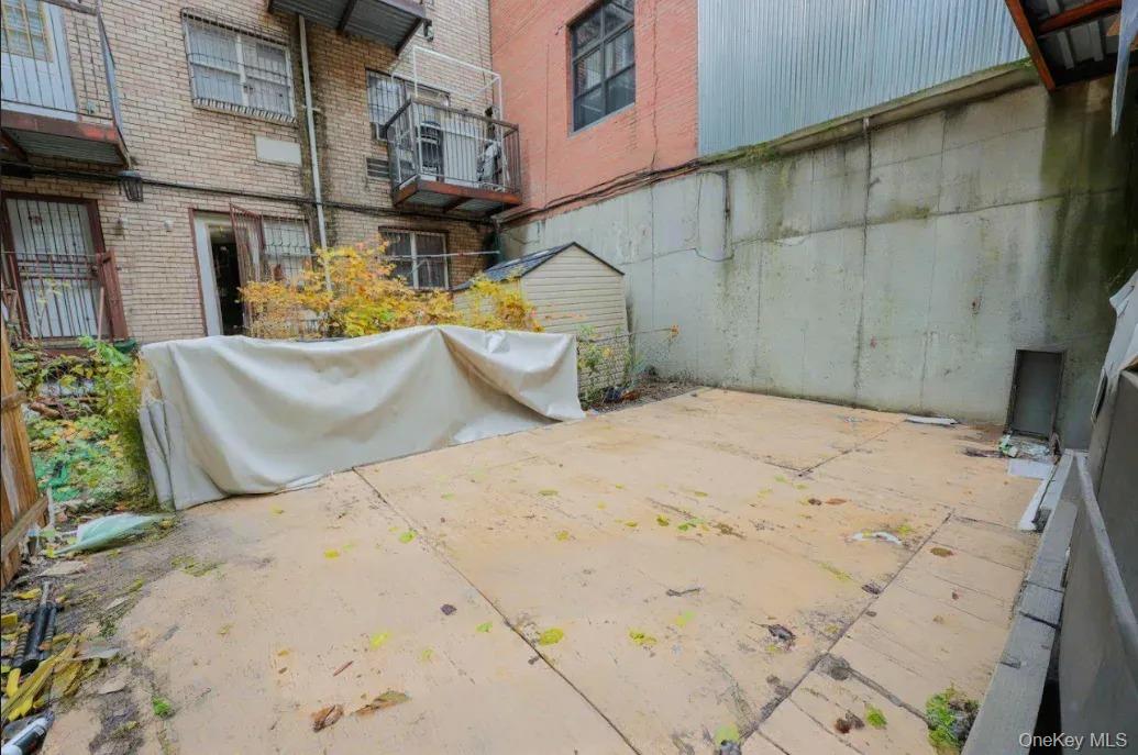 47 South 8th Street, Unit 1B Brooklyn, NY 11249 - Photo 3 of 7 a view of backyard of the house