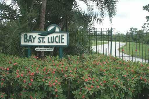 a view of sign board with a lake view
