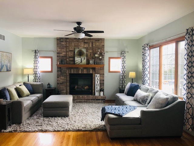 8708 South Rood Road Kingston, IL 60145 - Photo 5 of 15 a living room with furniture and a fireplace