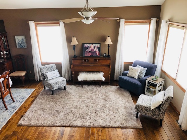 8708 South Rood Road Kingston, IL 60145 - Photo 7 of 15 a living room with furniture and a couch