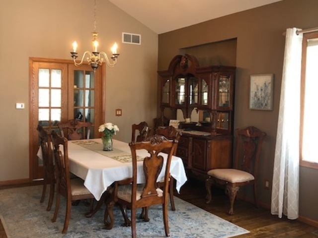 8708 South Rood Road Kingston, IL 60145 - Photo 8 of 15 a view of a dining room with furniture and window