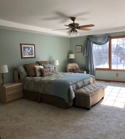 8708 South Rood Road Kingston, IL 60145 - Photo 9 of 15 a bedroom with furniture and a large window