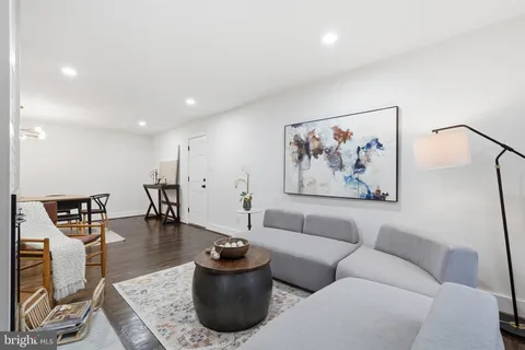 a living room with furniture and a couch