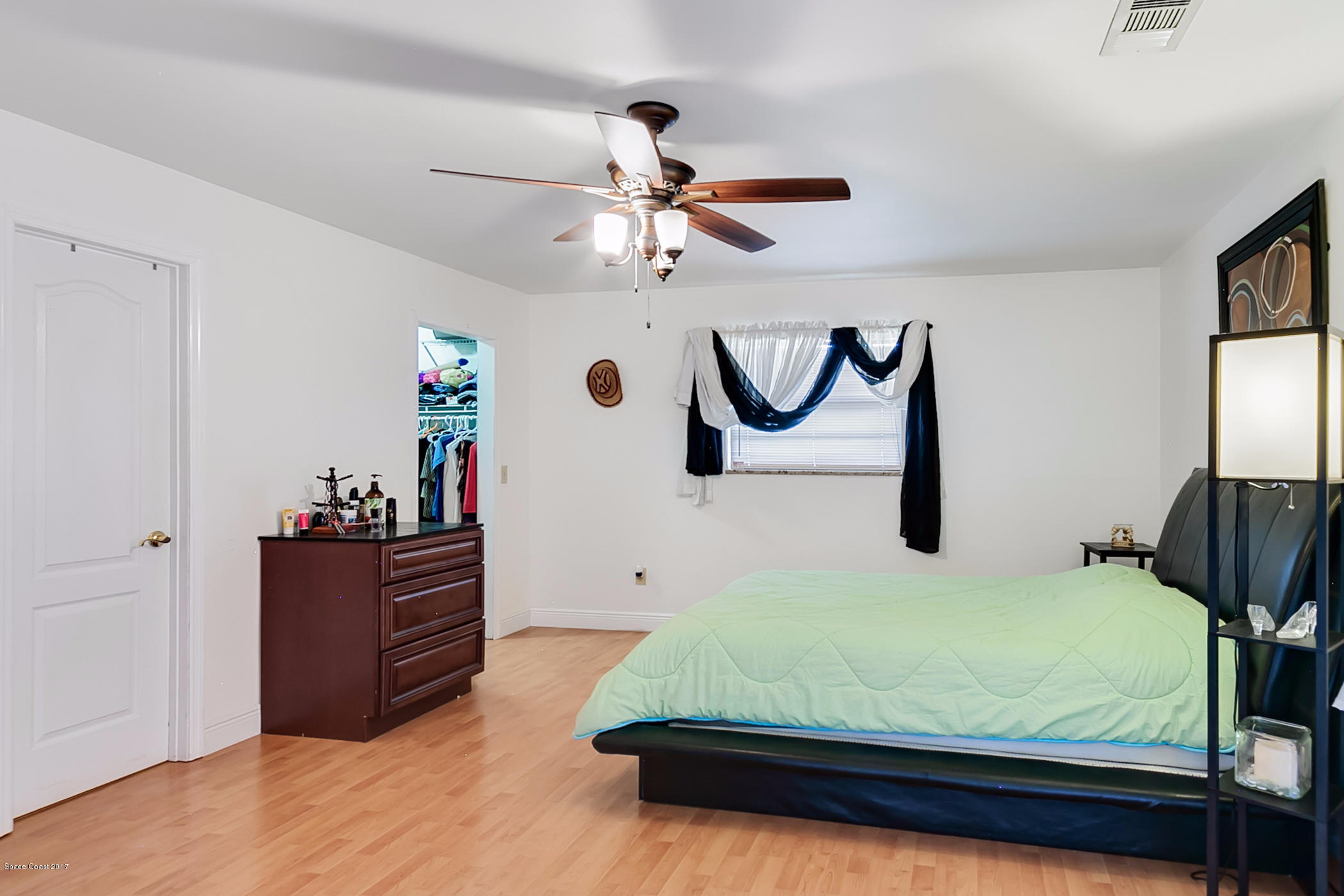 2838 Kosuth Road Northeast Palm Bay, FL 32905 - Photo 12 of 27 Master Bedroom with Walk In Closet