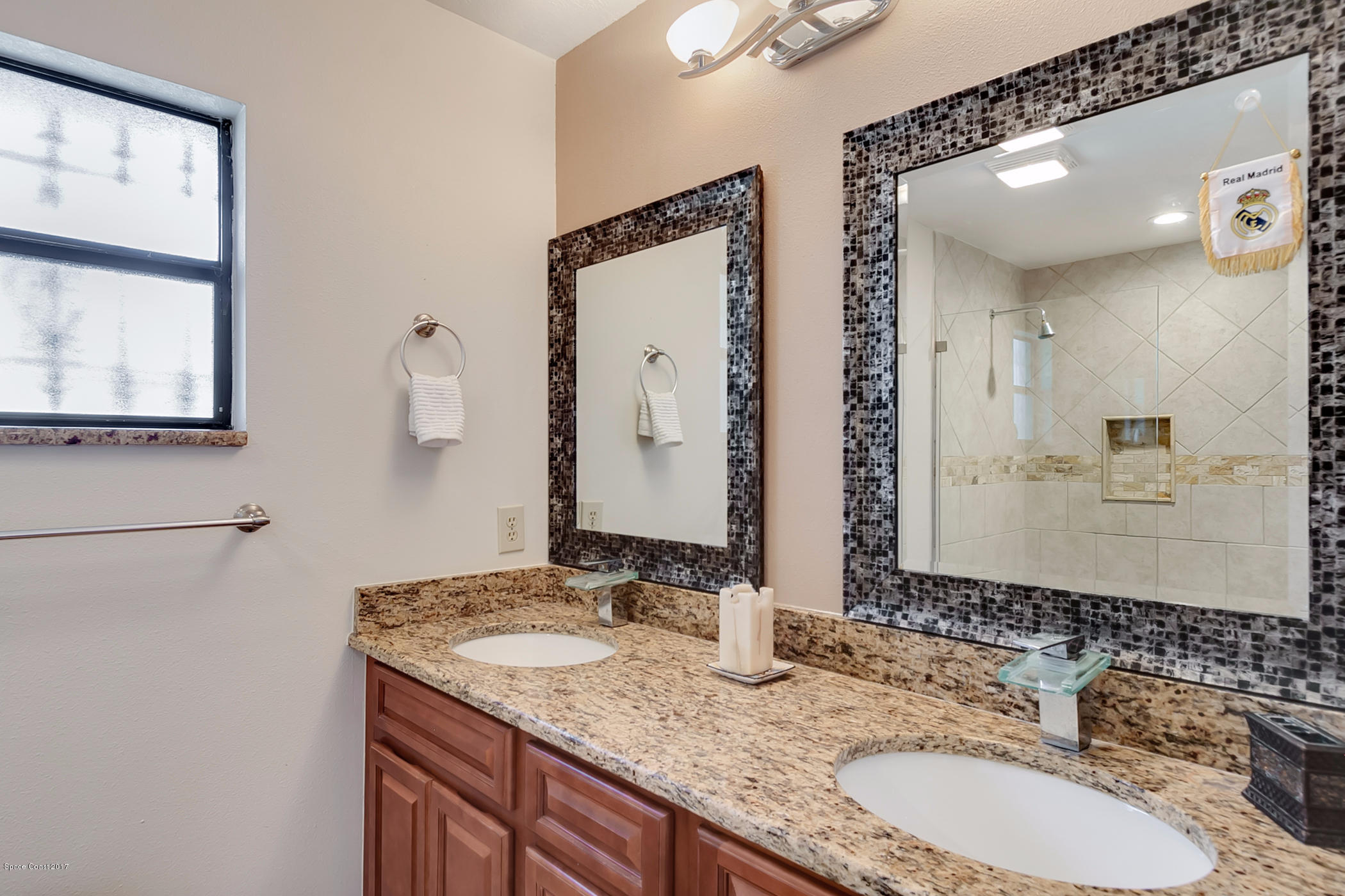 2838 Kosuth Road Northeast Palm Bay, FL 32905 - Photo 13 of 27 Master Bathroom with Double Sinks
