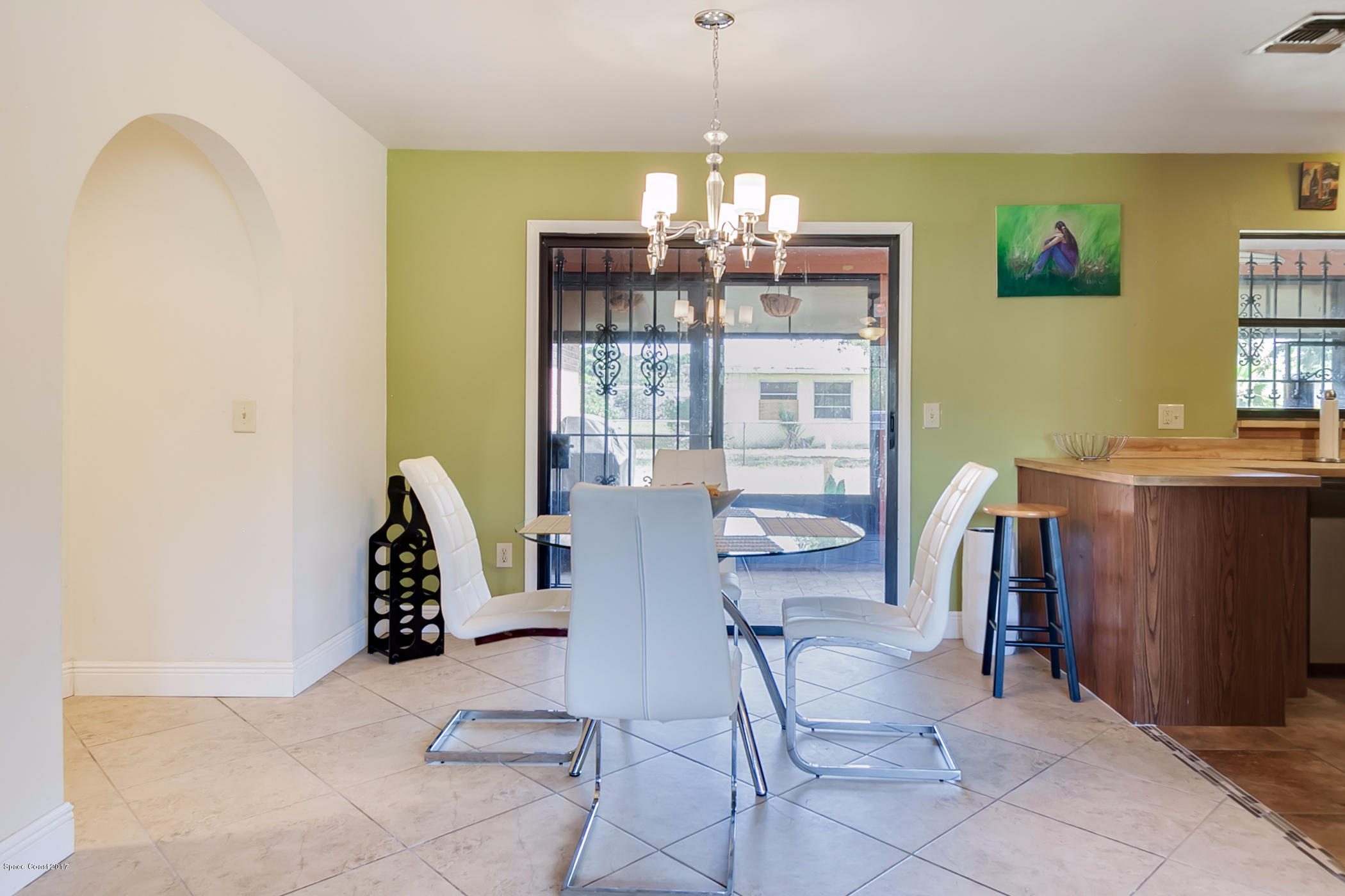 2838 Kosuth Road Northeast Palm Bay, FL 32905 - Photo 16 of 27 Dining Room Off Kitchen