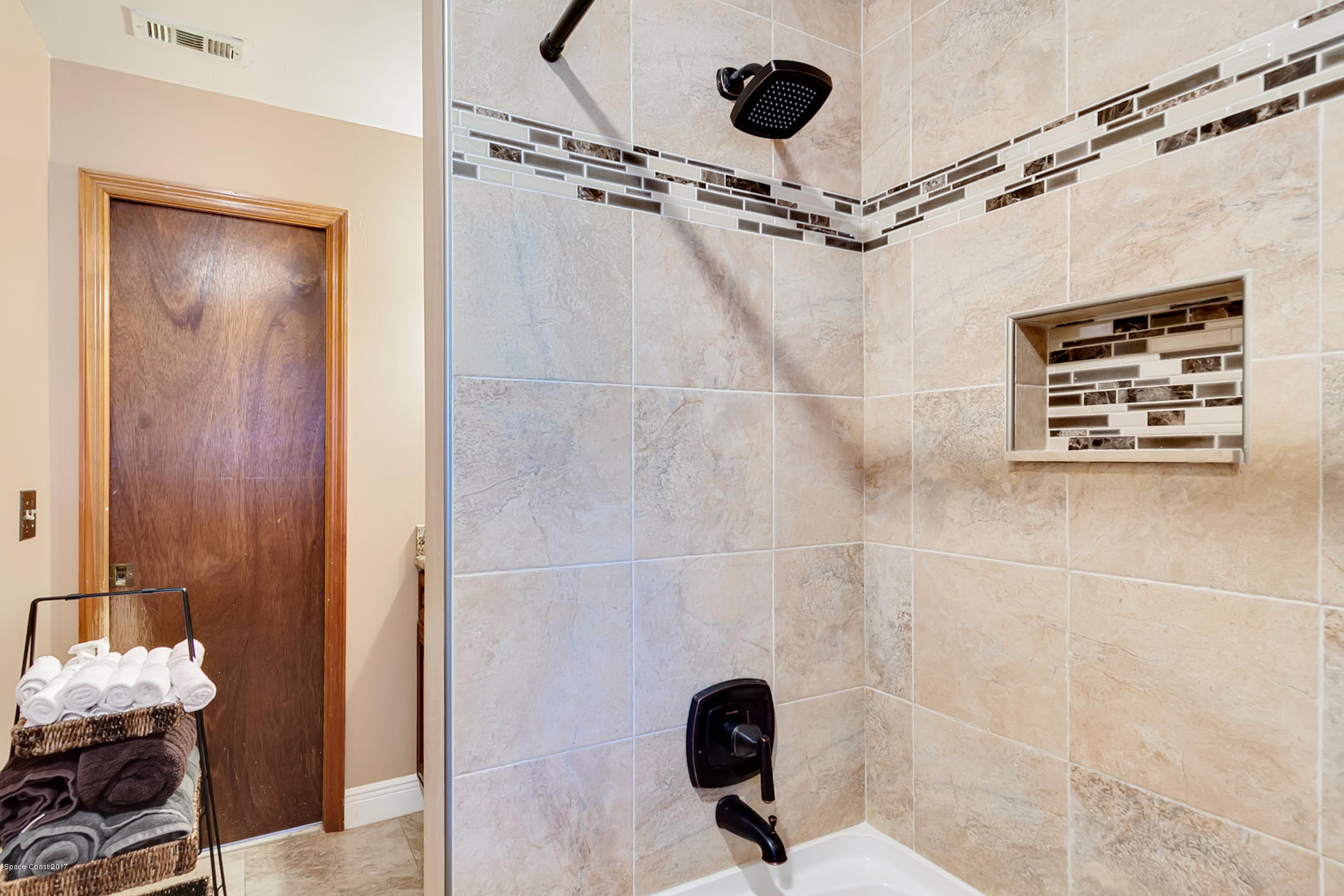 2838 Kosuth Road Northeast Palm Bay, FL 32905 - Photo 23 of 27 Hallway Bathroom Shower